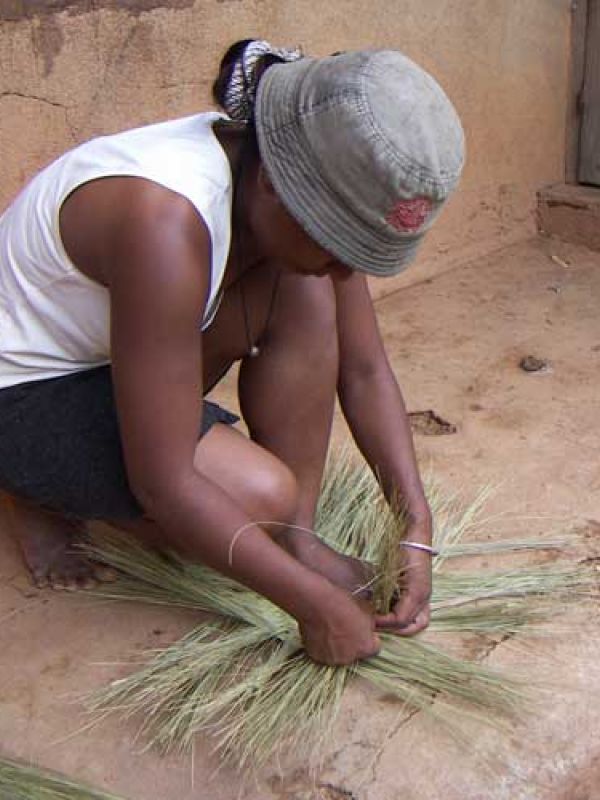 3. The grass is dried in the sun, then plaited. 